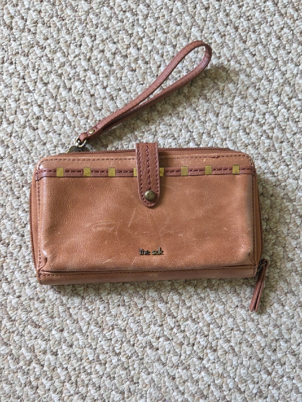The Sak Tan Leather Wristlet Wallet with Gold Stud Accents
